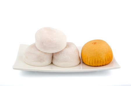 White and Orange Mochi on the White Plateの写真素材