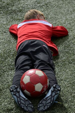 The goalkeeper is resting before the match.の写真素材