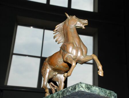 A small bronze figurine of a horse.の写真素材