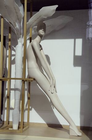 Mannequins in shop windows closed due to coronavirus.の写真素材