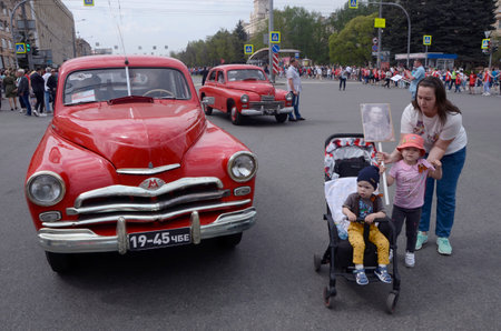 Red cars of the Moscow automobile plant "Pobeda". Filmed on May 9, 2019 during the Victory Parade and the Immortal Regiment action.のeditorial素材