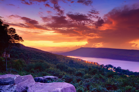 Dramatic sunset over lake at Lam Ta Khong Reservoir, Nakhon Ratchasima province, Thailand.の写真素材