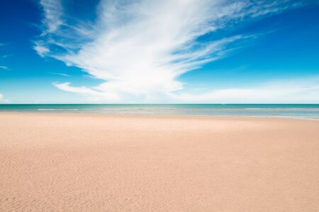 Tropical beach with white sand, fresh turquoise sea, deep blue sky and white clouds in Pranburi,...