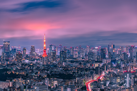 Beautiful twilight scene of Tokyo Tower and urban skyline with fantastic clouds after the rain, Tokyo, Japan.のeditorial素材