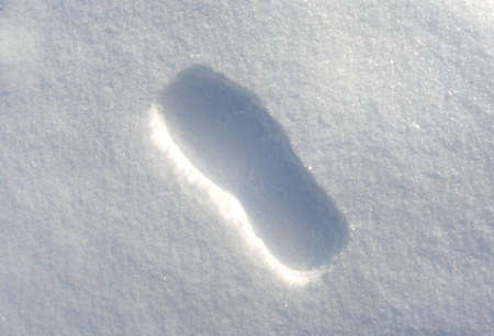 Footstep in snow       の写真素材