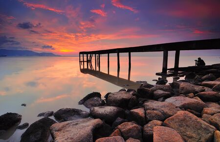 Long Exposure Sunrise Seascape with Abandon Jettyの写真素材