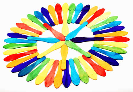 circle ice cream spoon arrangement with star in middleの写真素材