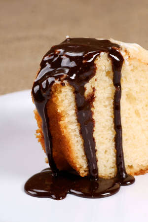 sponge cake with chocolate syrup の写真素材