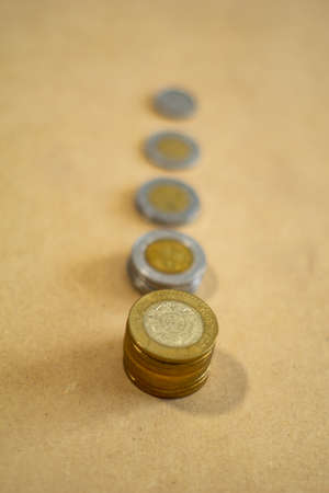 money face mask bills and coins with jar of glassの写真素材
