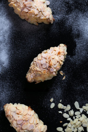 Homemade almond cookies on black background, top view, copy spaceの写真素材