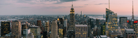 New York City Manhattan skyline panorama at sunset with skyscrapers.の写真素材