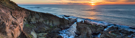Panoramic view of the coastline at sunset, Monterey, California