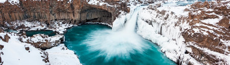 Panoramic view of Godafoss waterfall in winter, Icelandの写真素材
