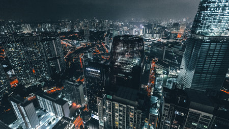 Aerial view of skyscrapers in Hong Kong at night.の写真素材