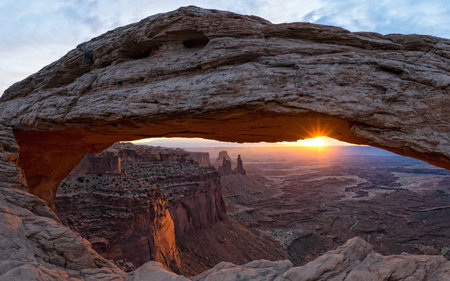 Sunset at Mesa Arch in Canyonlands National Park, Utah, USAの写真素材