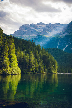 Idyllic alpine lake in Dolomites mountains, Italyの写真素材