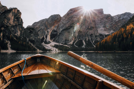 Lake braies in south tyrol, Italy. Wooden boat on the lakeの写真素材