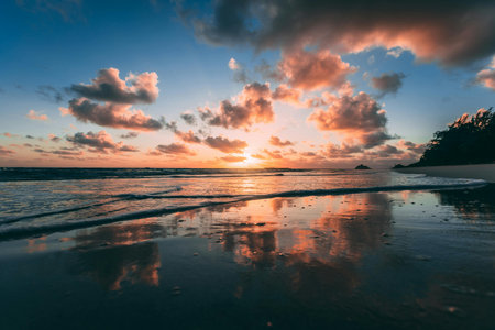 Beautiful sunset on the beach. Seascape with clouds and sky