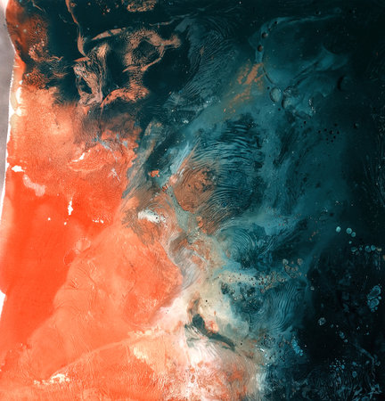 abstract background with blue and orange watercolor splashes and stainsの写真素材