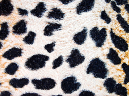 texture of print fabric striped leopard for background, closeup of photo