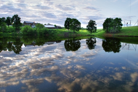 walk along the pond in the villageの写真素材