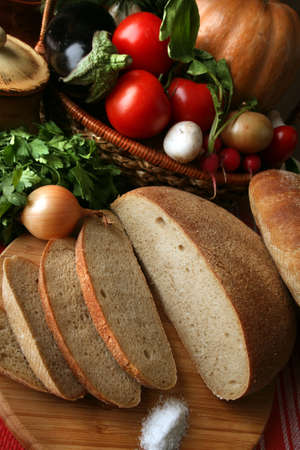 close-up of vegetables and bread in a basket