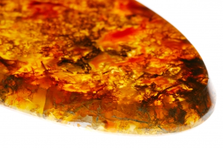 macro various single semi-precious stones isolated on white background studio