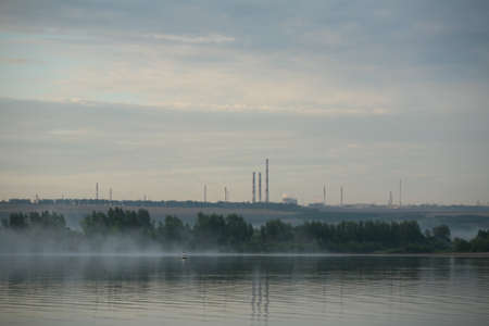 beautiful summer landscape beautiful sunset over the river, beautiful clouds and trees on the shoreの写真素材