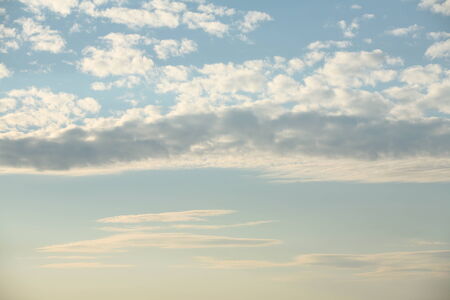 beautiful clouds at sunset over the river in the summer