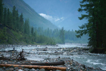 beautiful summer mountain landscape river, cliffs, forests and wonderful clouds on blue sky 