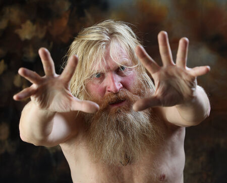 close-up portrait of a naked man with a beard and mustache, expressing strong emotions, the studio...