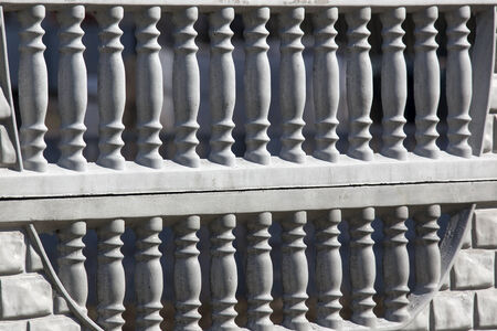 isolated close-up part of the gray concrete fence sunny dayの写真素材