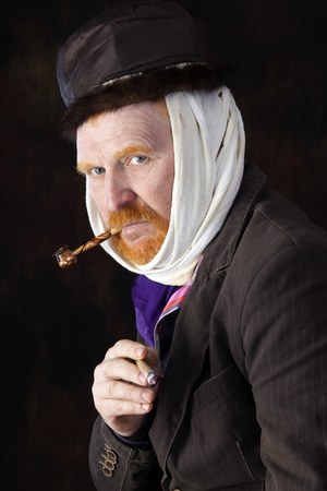 close-up portrait of the adult artist with red beard and mustache in the style of Vincent van Gogh...