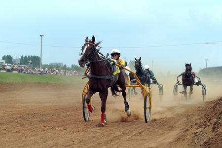 Naberezhnye Chelny, Russia - 06 June 2006:horse racing at the Hippodrome of Naberezhnye Chelny sunny summer dayのeditorial素材
