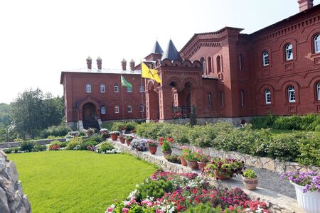 Summer landscape friary near the forest on a clear cloudless dayのeditorial素材