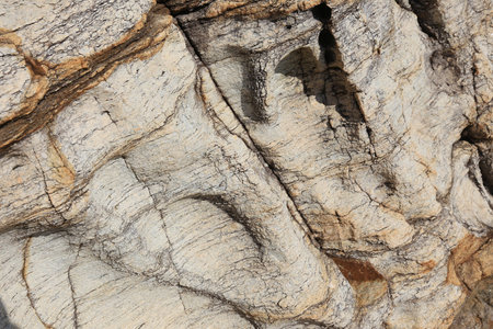 isolated macro texture coastal cliffs in sunlight