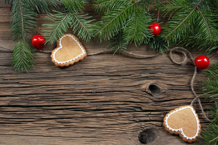 close-up of beautiful festive Christmas still life of the branches of spruce, cookies and spice on...