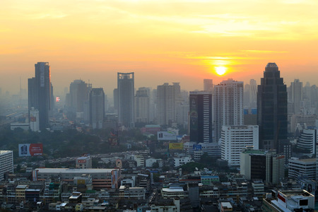 BANGKOK, THAILAND - December 15, 2015: beautiful foggy sunset over Bangkok, view from skyscraper December 15, 2015 in Bangkok, Thailand.のeditorial素材