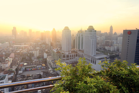 BANGKOK, THAILAND - December 15, 2015: beautiful foggy sunset over Bangkok, view from skyscraper December 15, 2015 in Bangkok, Thailand.のeditorial素材