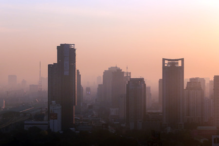 beautiful foggy sunset over Bangkokの写真素材