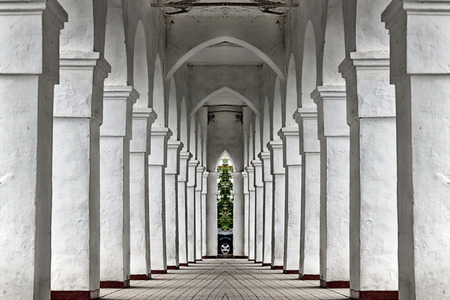 isolated closeup of white columns of an ancient buildingの写真素材