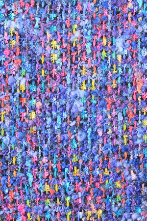 macro texture wool black fabric with colored speckles studioの写真素材