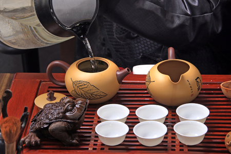 Close-up table for the tea ceremony utensils and bamboo on white background studioのeditorial素材