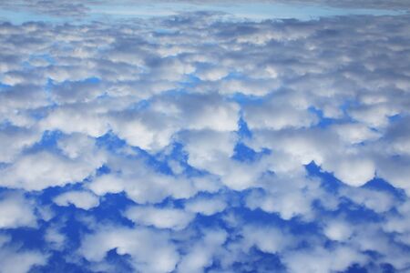 landscape beautiful cumulus clouds against a blue sky on a sunny day