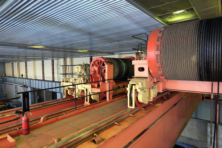 Industrial interior hydroelectric turbine hall, turbines, equipment, cranes