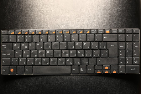 macro black keyboard on dark background studio