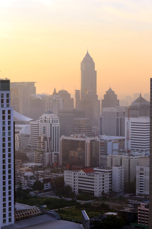 BANGKOK, THAILAND - December 15, 2015: beautiful foggy sunset over Bangkok, view from skyscraper December 15, 2015 in Bangkok, Thailand.のeditorial素材