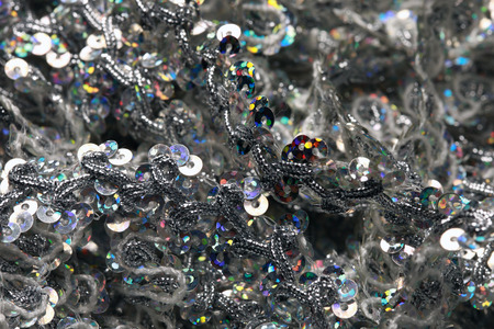 macro texture silver sequins sewn onto the fabric