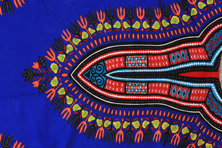 macro texture fragment of cloth with a pattern in the style of embroideryの写真素材