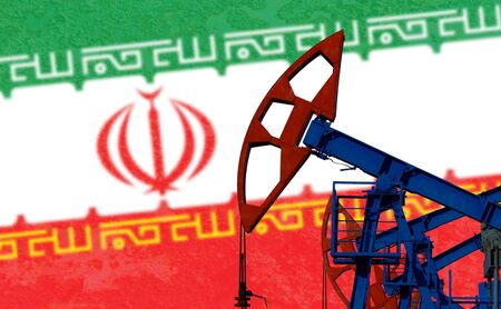 close-up of the oil pump on the background of the flag Iranの写真素材